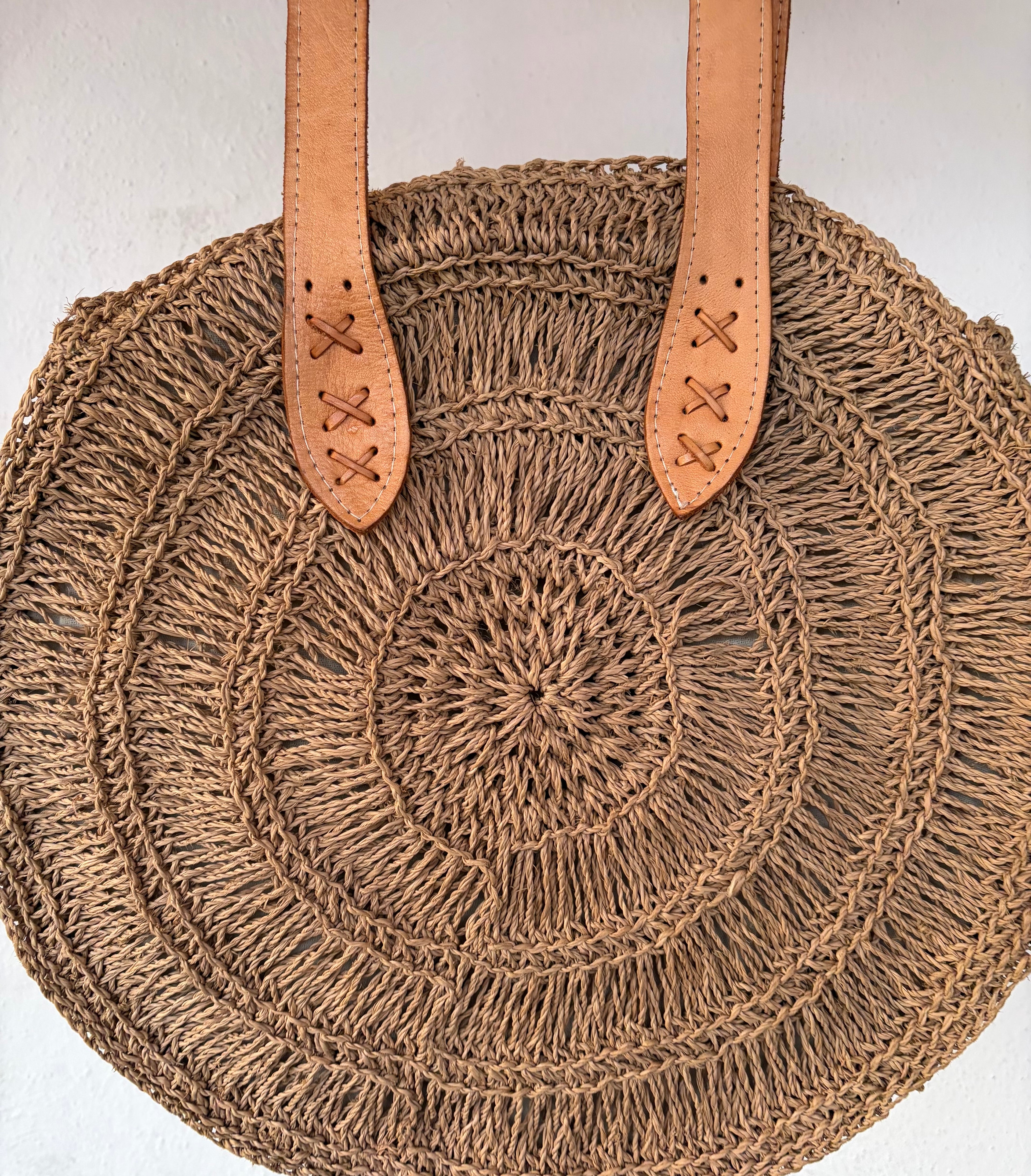 Round straw beach tote bag