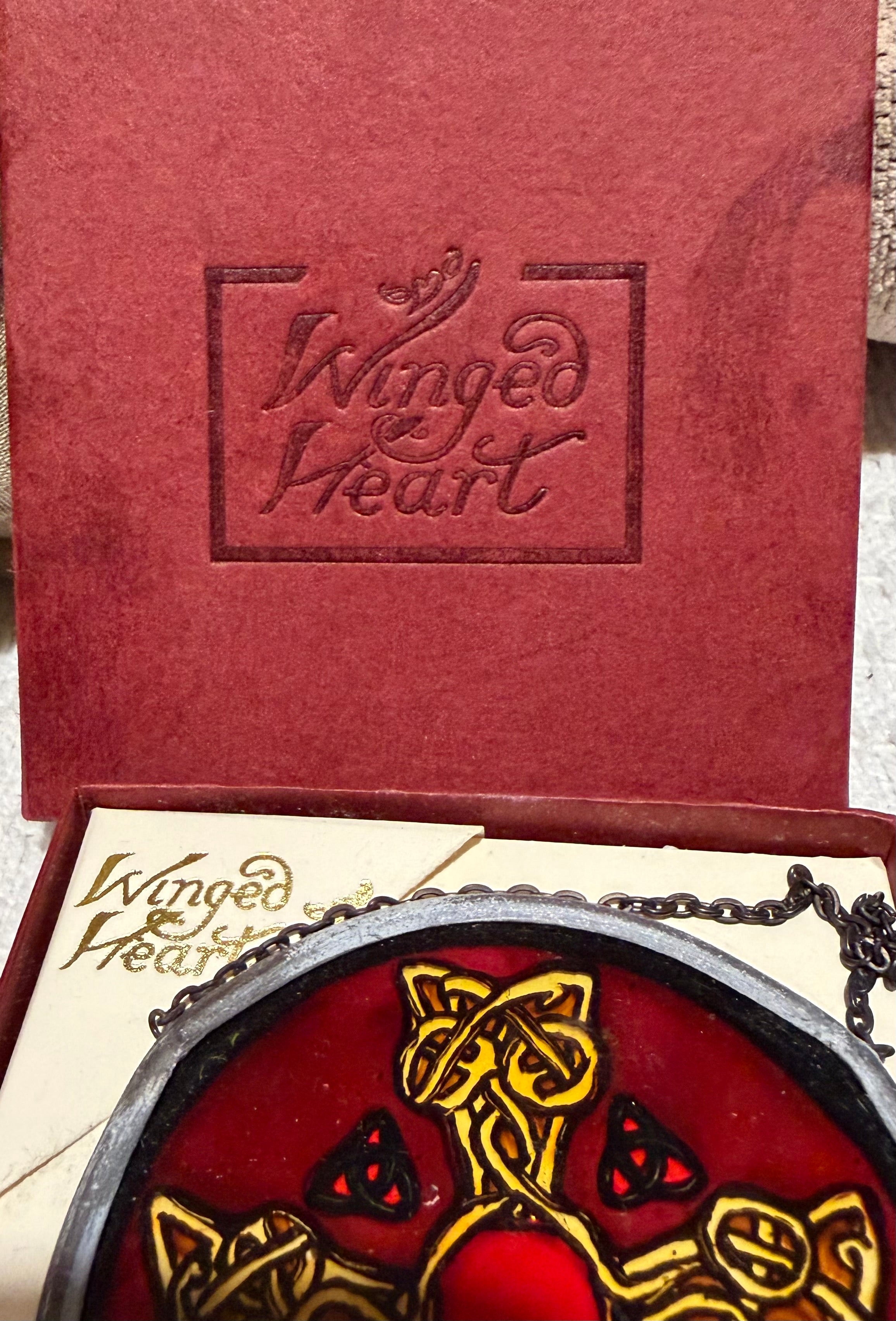 Winged heart stained glass